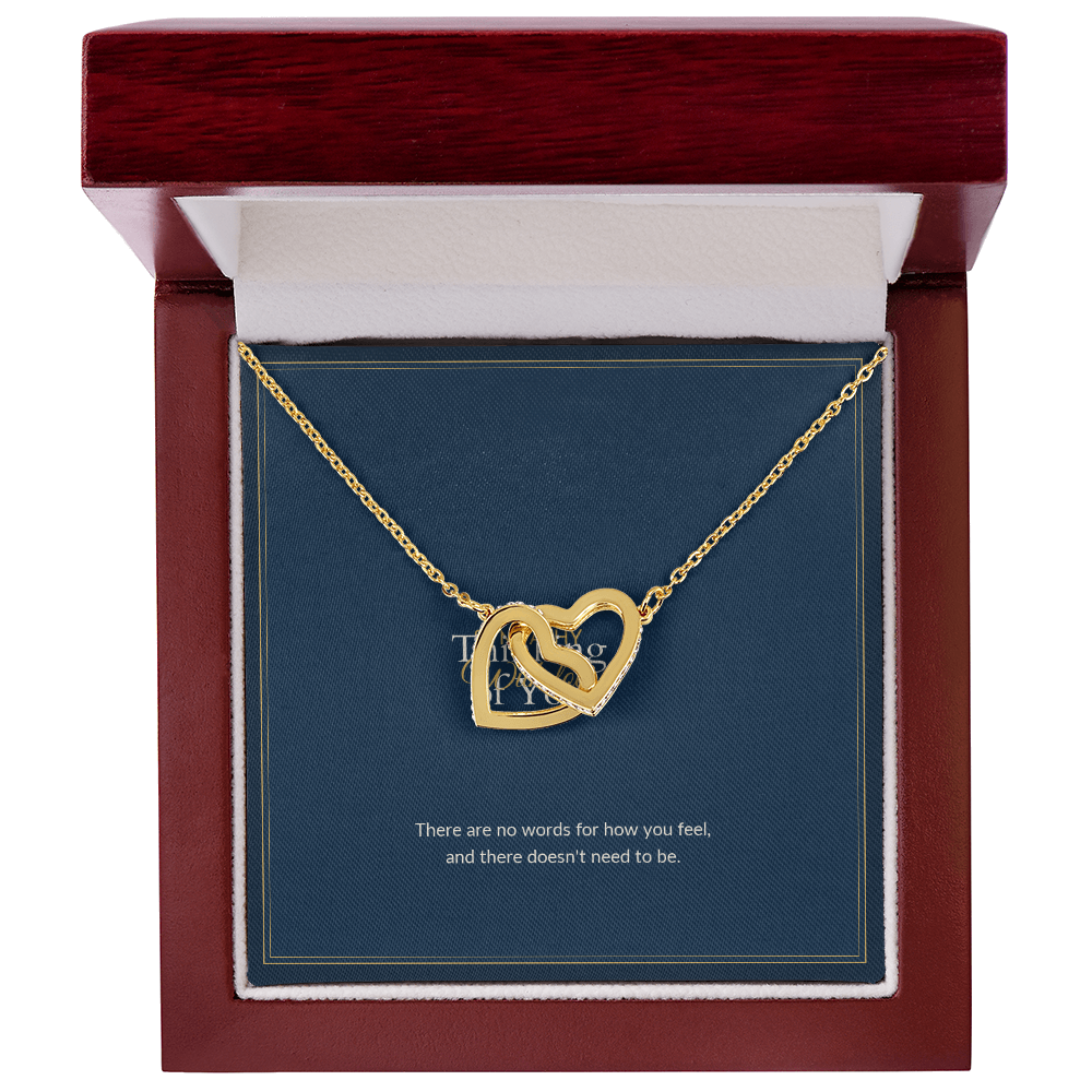 Interlocking Hearts necklace, 18k yellow gold, on a keepsake card for Friend, in a luxury wooden box (view 1)