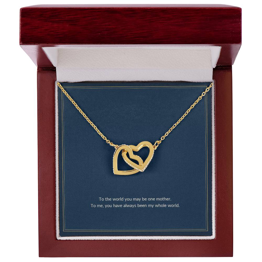 Interlocking Hearts necklace, 18k yellow gold, on a keepsake card for Mom, in a luxury wooden box (view 1)