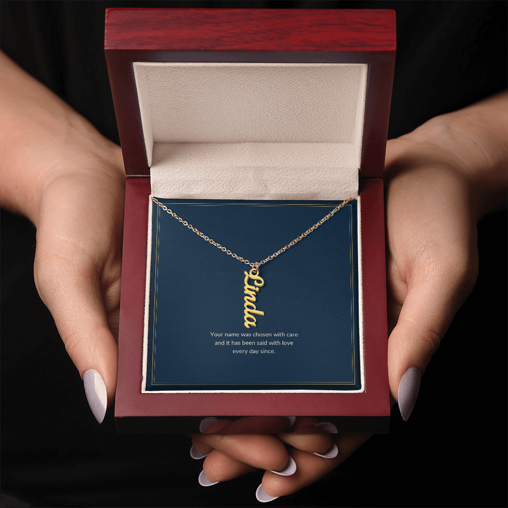 Vertical Name necklace, 18k yellow gold, on a keepsake card for Granddaughter, in a luxury wooden box (view 2)