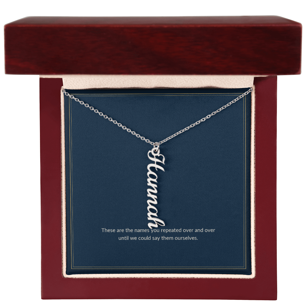 Multi Vertical Name necklace, polished stainless steel, on a keepsake card for Mom, in a luxury wooden box (view 1)
